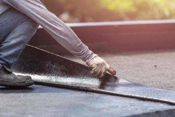 Professional Basement Waterproofing technician working in Hainesport, NJ